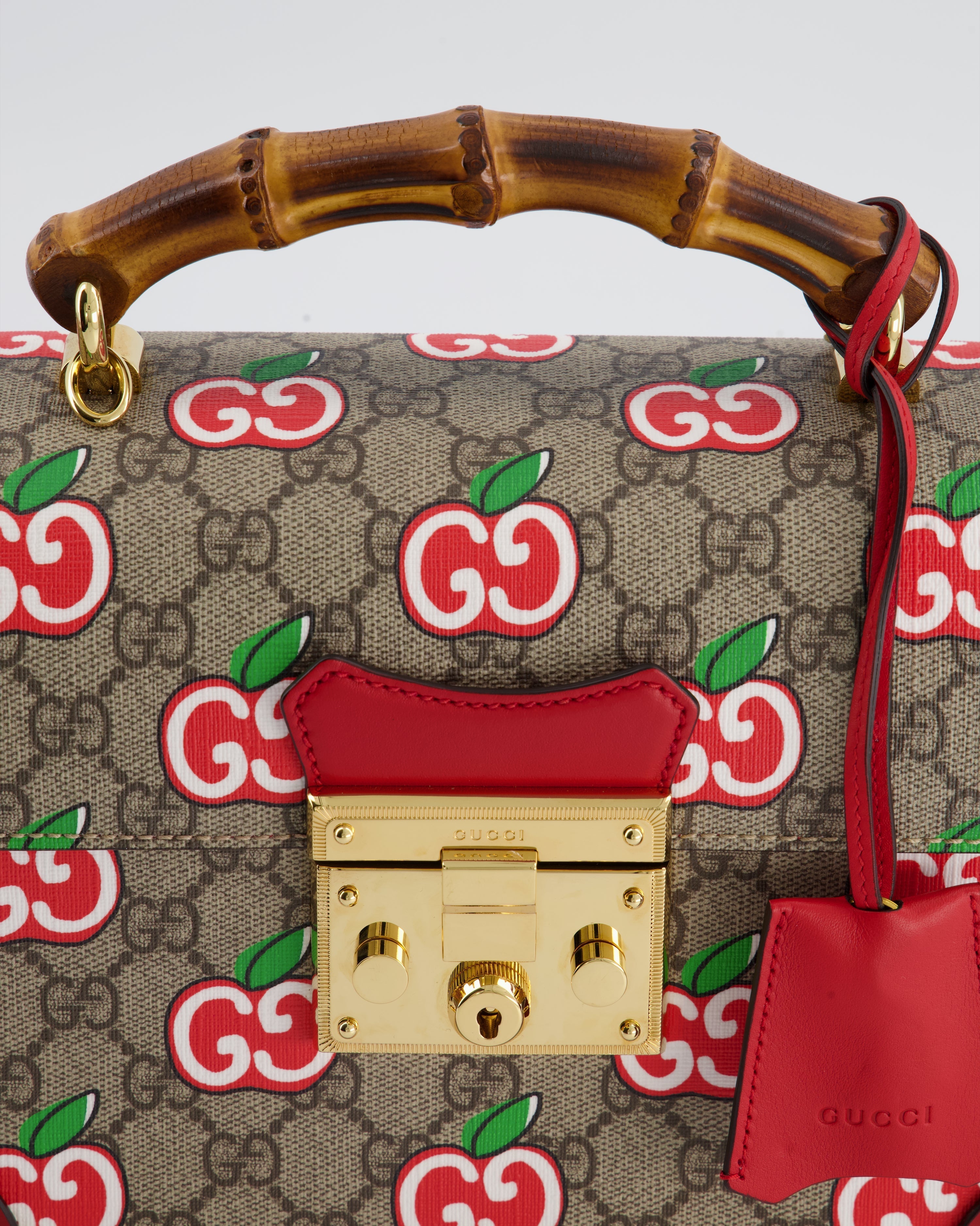 Gucci GG Supreme Padlock Apple Monogram Shoulder Bag with Bamboo Handle and Gold Hardware